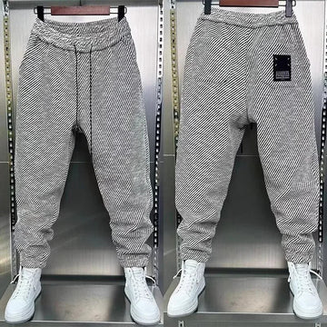 休闲裤男New Autumn Men's Sports Casual Pants Trendy Loose-Fit Elastic Waist Versatile Bunded Feet Pants Casual Style