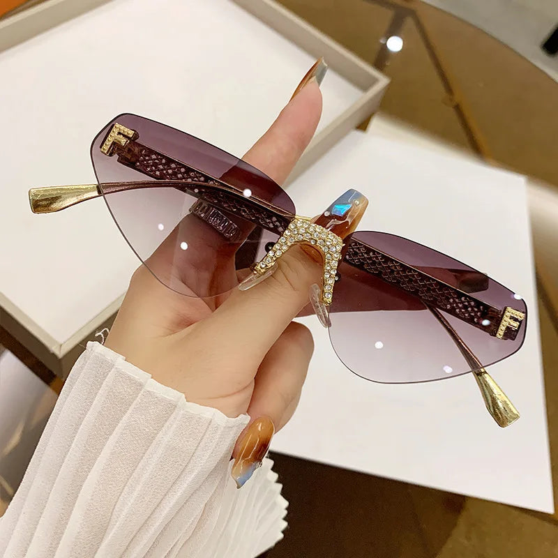 Popular Rimless Rhinestones Women Sunglasses 2024 Luxury Designer Black Cat Eye Sun Glasses Small Beach Eyewear Shades UV400
