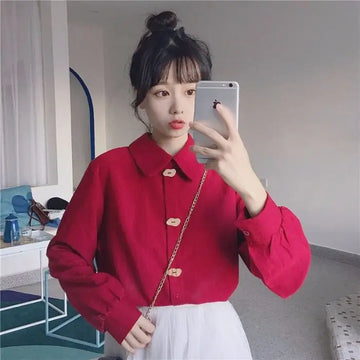 Áo sơ mi nữ thời trang 2025