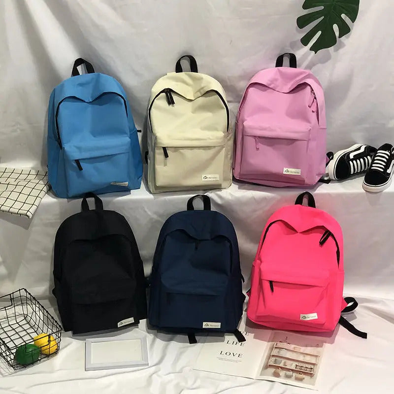 包包男Schoolbag female Japanese simple wild campus backpack Korean version ins college wind male student backpack leisure handbag